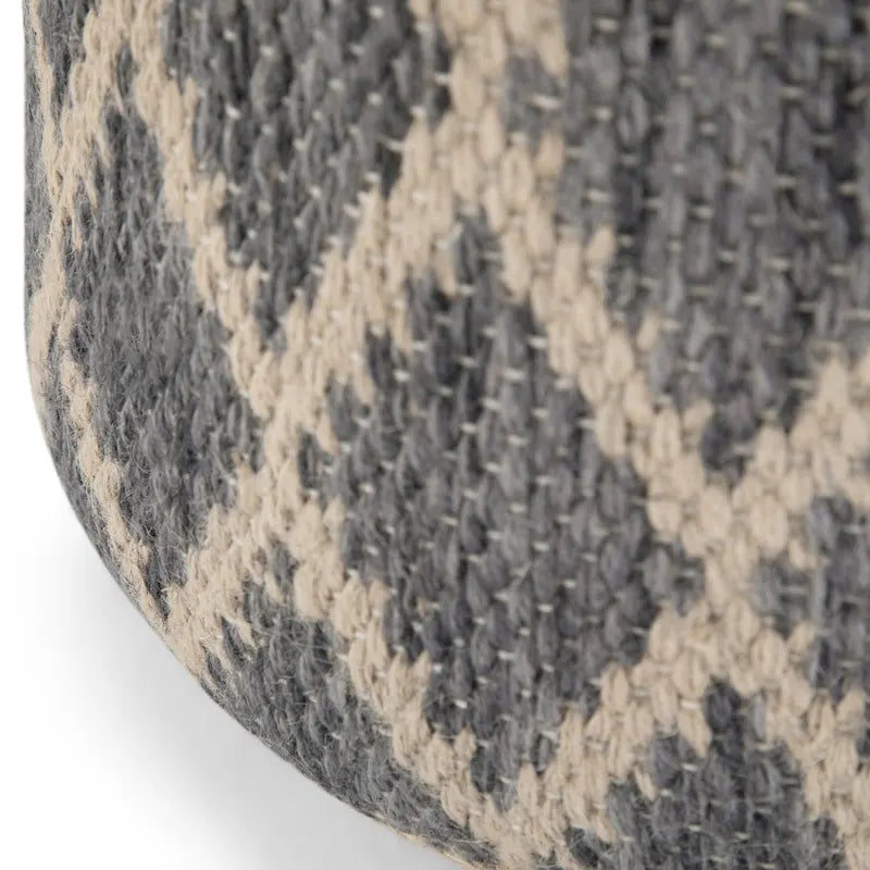 Pouf rotondo boho in juta e cotone intrecciati a mano con motivo a rombi